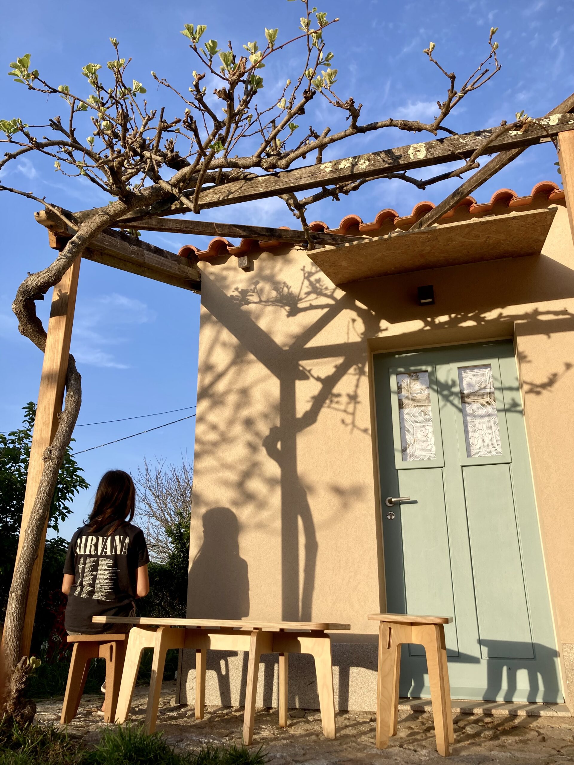 Entrada da Casa do Lento sob a pérgola
